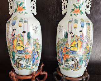 Pair of Chinese double side decorated famille rose vases