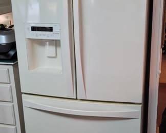 Kenmore Refrigerator freezer, French style.