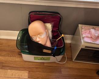 Practice supplies for a beauty student,  eyelash Extensions, paraffin and wax warmers 