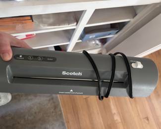 Scotch laminator with lamination sheets, as well as a label maker with labels bundles