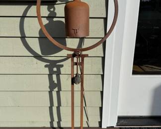 134 TomTorrensCastIronGardenBellCylinderinHoopDesignonStand