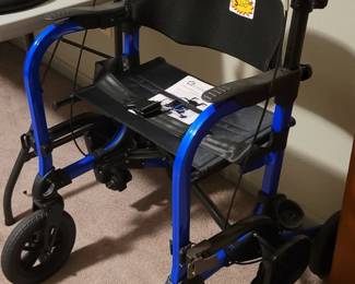 All-terrain walker with seat.