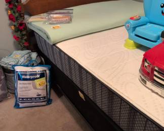 Full-sized head board, mattress, box springs, and frame.  Also double dresser with  mirror