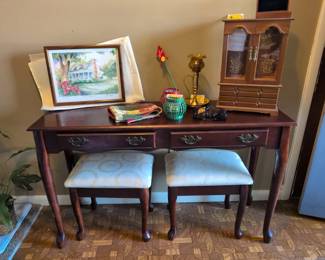 Entry table with two stools.