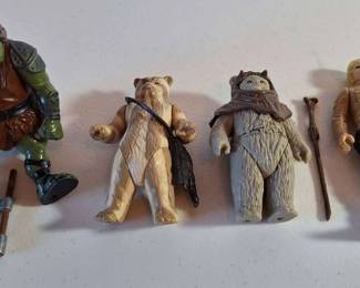 Star Wars Luke Skywalker Bespin Fatigues and 3 other action figures with accessories.