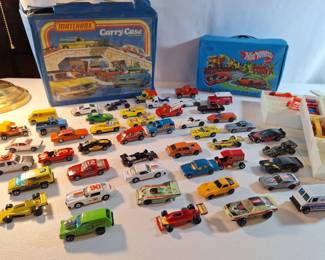 02 Vintage Matchbox and Hotwheels Cars with 2 Cases. 56 Cars