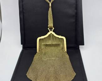 This is a fully gold mesh purse. It contains 1-4mm round cabochon blue sapphire
and 2-3mm round blue sapphires. The sapphires are eye clean and is an articulated piece
in 14k yellow gold.
The necklace has a total gold weight of grams
Current written Jeweler Appraisal, included with purchase, $28,000.00