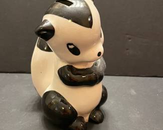 Ceramic skunk bank 