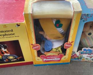 Pinocchio Puppet, Baby Teddy Ruxpin, and Goofy Phone