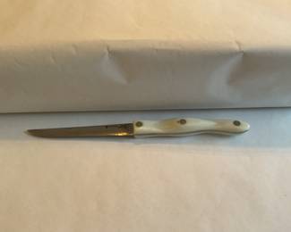 Cutco with sleeve and book