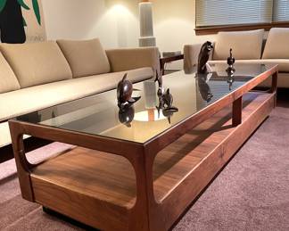 Carved wood objects, Mid Century walnut and smoke glass coffee table and end tables