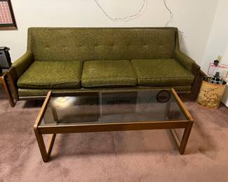 Midcentury couch
Midcentury walnut and smoke glass coffee table