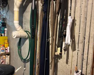 Several fishing poles and reels