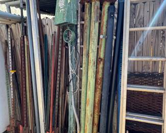 Fence posts, lamp, posts, ladders, and miscellaneous metals