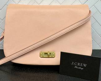 $50; J. Crew Sophie bag in pale pink with dust cover; 9x7