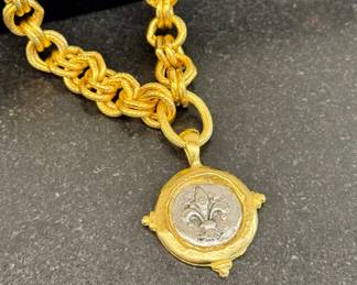 $100; Susan Shaw fleur de lis pendant and link necklace
