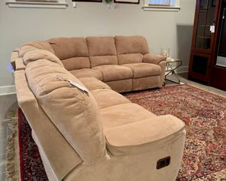 $500; L-shaped sectional with two end chairs reclining; a small tear noted at the back of one of the cushions; 116x42x37; 95x42x37.     $200; Karastan rug with fringed edges, needs professional cleaning due to pet damage; 8.5'x10.5'