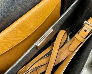 $200; authentic Prada Saffiano Lux bag with dust cover and box, has interior attached wallet (as is--missing one of the hooks to attach strap); interior view; 10x7