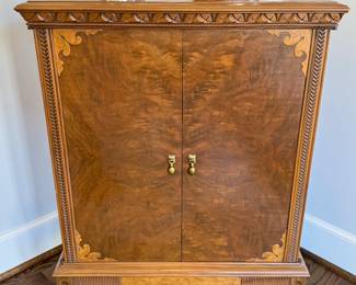 SOLD; vintage radio cabinet by Irving with intricate details and wood grain; 26x16x36