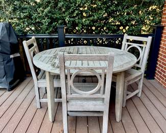 Solid teak patio table with 3 chairs. 