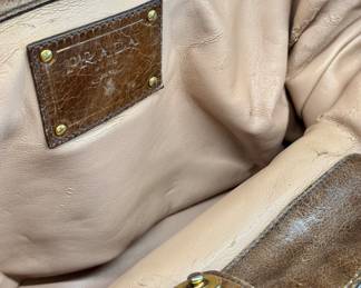 $550; vintage authentic Prada shoulder bag purchased in Italy at a time when this design was not available in the US; close up view of interior; 15x9