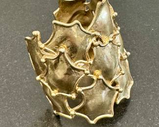 $100; wide cuff bracelet