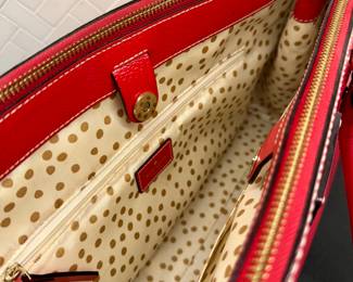 SOLD; red Kate Spade hand bag in ideal condition; close up of interior; 15x9