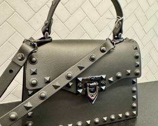 SOLD unbranded jelly bag lined with studs; 7x6