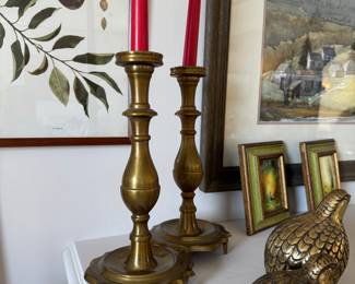 Brass candles and pheasants