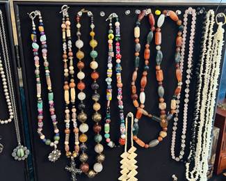 Beads are all hand painted vintage glass beads with Sterling Crosses.