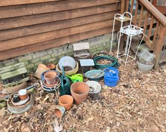 Clay pots, wrought iron pot holders
