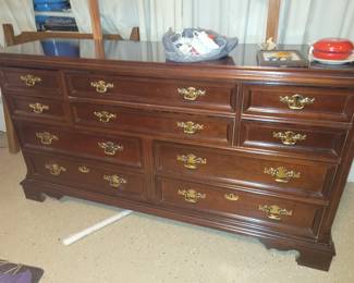 Beautiful mahogany dresser with mirror, chest on chest and nightstand maker is bassett 