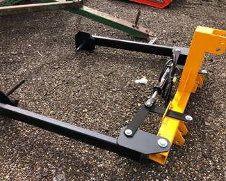 ROUND BALE HAY UNROLLER