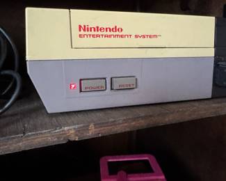 Nintendo Entertainment Systems TWO of them, both in working condition with a game in each and two controllers each!