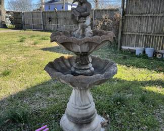 Double bird bath and cherub