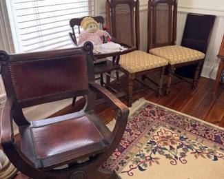 Leather chairs and baby high chair