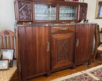 Sideboard buffet heavy carved doors, beveled glass doors and marble top