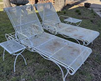 White metal chaise lounges