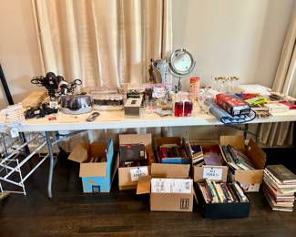 Various personal care items, bed/bath accessories, books, and functional organization 