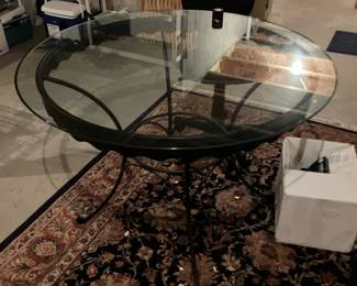 Glass top wrought iron table