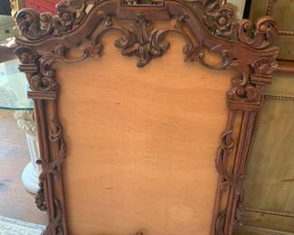 Intricately carved frame