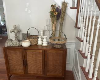 Pottery Barn decorative items, candlesticks, and baskets. 