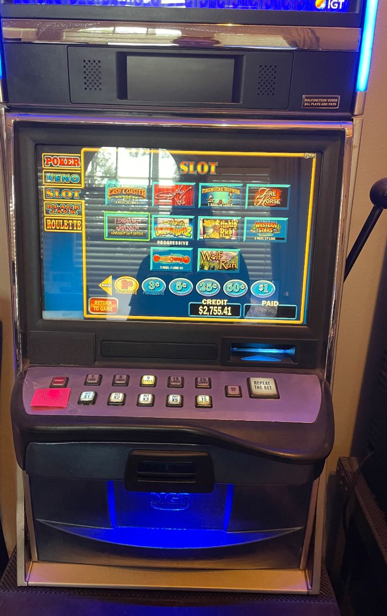 Video slot with multiple loaded games. $3000 will not be located on site. Located in Huntsville for pickup.