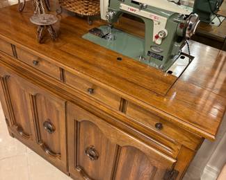 ‘Swing-Away Doors’ Solid Pine Wood Sewing/Storage Cabinet with New Home Deluxe Sewing Machine by Janome