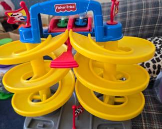 day care Fisher Price race tracks