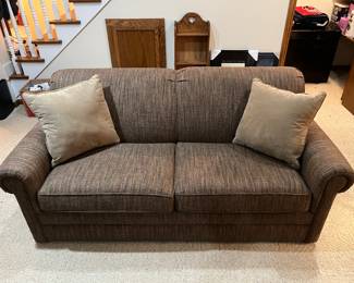 Upholstered sleeper loveseat in excellent condition.