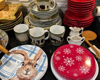 Set of Warren Kimble dinnerware, “Animal Collection” pattern; set of Ambience Collections “Fleur Rouge” plates and bowls; three Pier 1 rabbit plates.