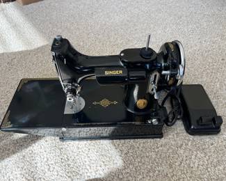 Singer Featherweight sewing machine.