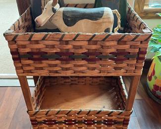 Two-tier chair-side crafting basket.