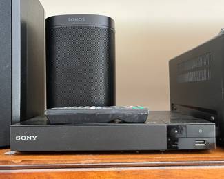 Sonos “One” bookshelf speaker; Sony Blu-Ray disc/DVD player.